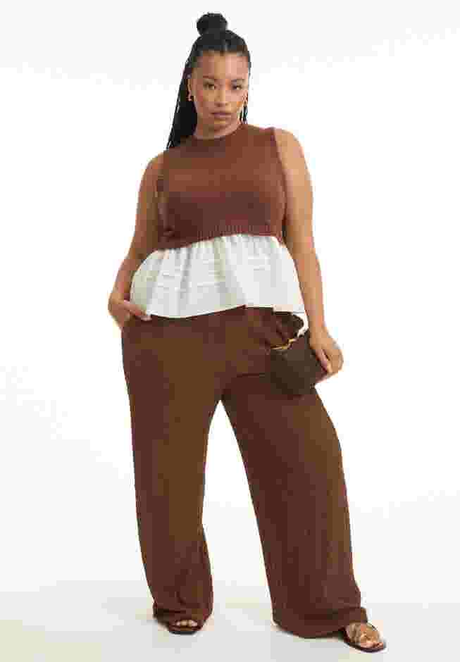 Sleeveless Peplum Sweater image number 0